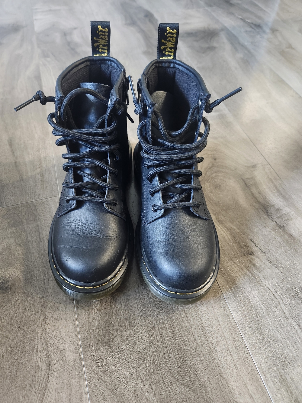 Dr. Martens Black Leather Kids Lace-Up Ankle Boots with Yellow Stitching